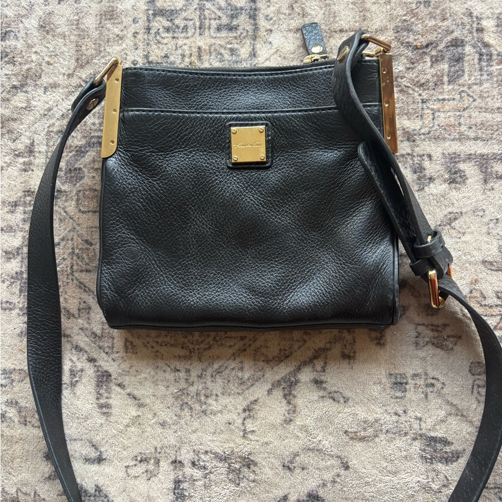 Black Leather Kenneth Cole Crossbody Bag with Gold Accents